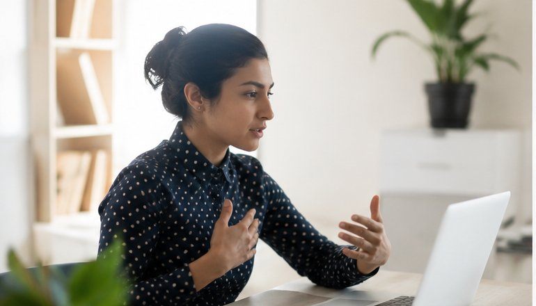 Someone practicing interview questions at a desk
